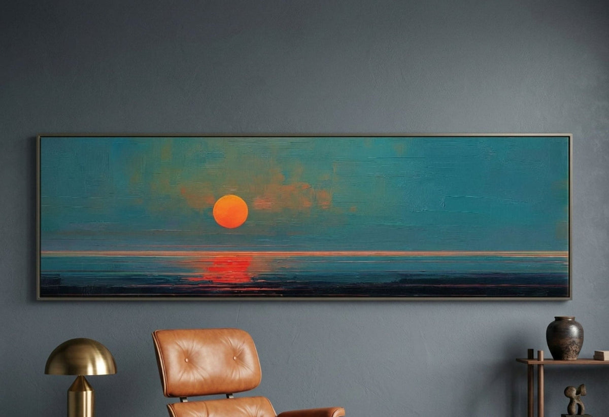 Mid-century modern living room featuring framed ocean sunset wall art above a leather lounge chair